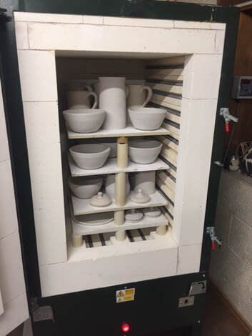Everything in the kiln ready for firing Picture